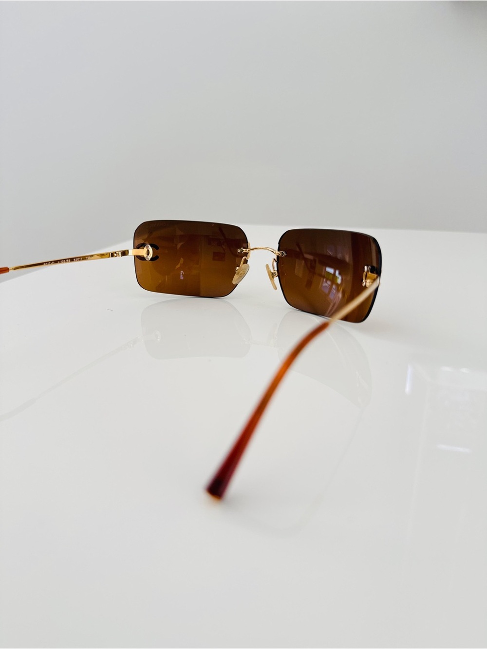 CHANEL Brown Rimless Sunglasses with Gold CC Accents - Picture 12 of 14